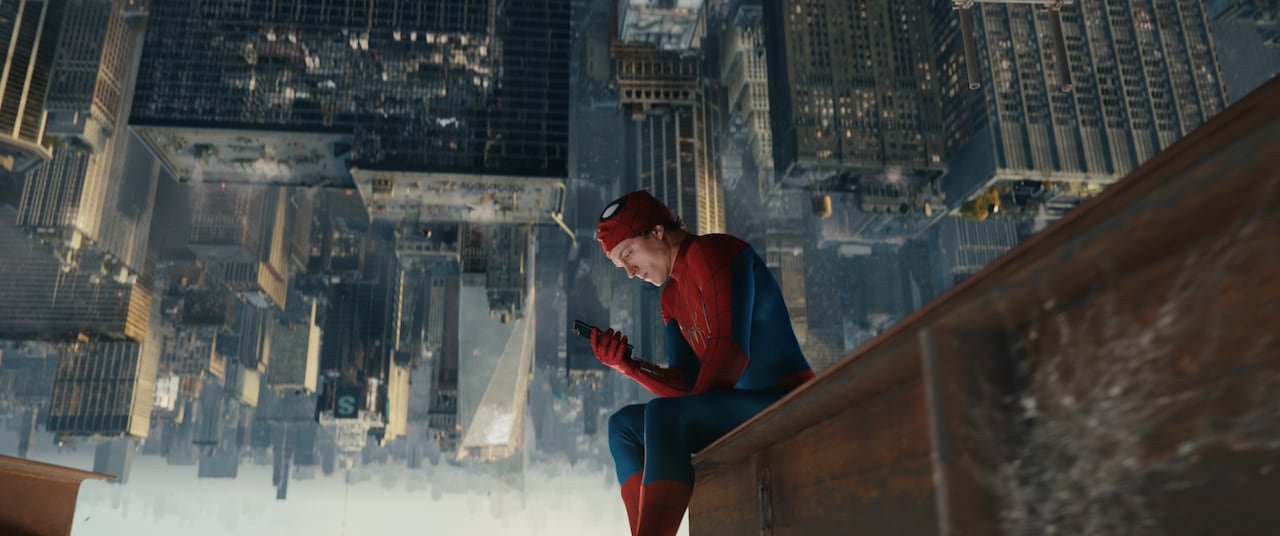 default-217 man in spiderman outfit sits atop a skyscraper looking at his phone , the backround is upside down.